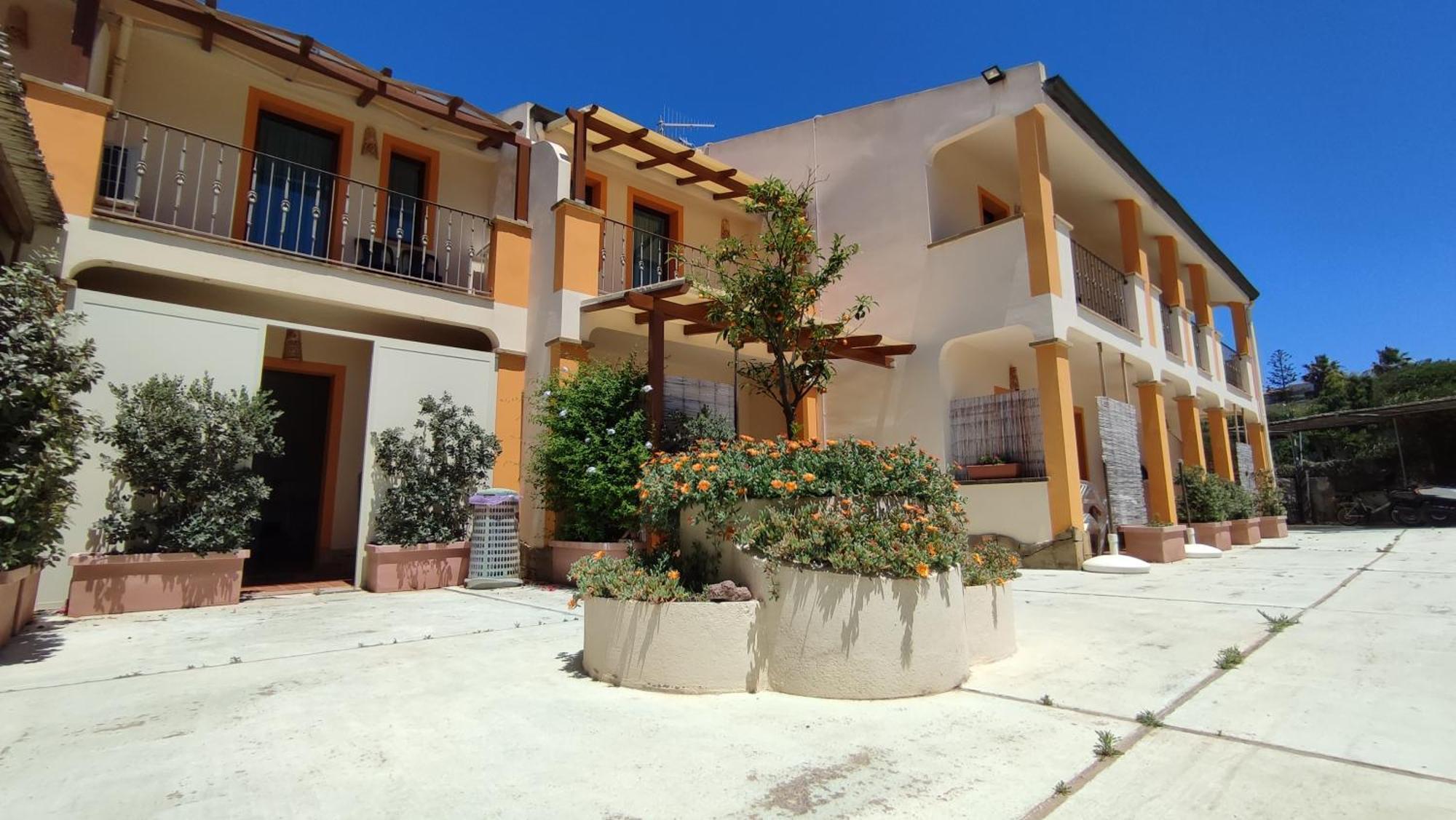 Hotel Le Sabbie Calasetta Bagian luar foto